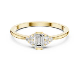 emerald diamond three stone engagement ring in yellow gold