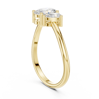 oval and pear diamond two stone engagement ring in yellow gold