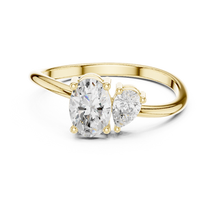 oval and pear diamond two stone engagement ring in yellow gold