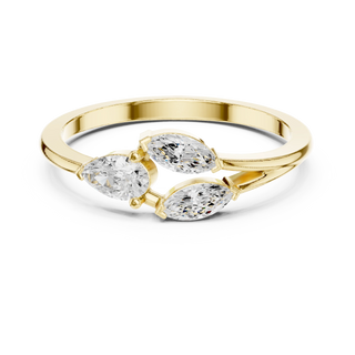 pear and marquise diamond bypass engagement ring in yellow gold