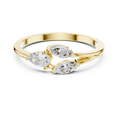 pear and marquise diamond bypass engagement ring in yellow gold
