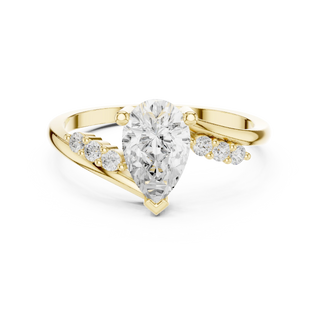 Pear lab grown diamond bypass ring in yellow gold
