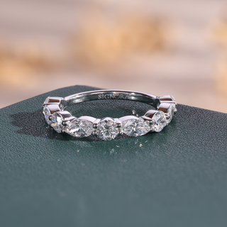 White gold lab grown diamond anniversary band with alternating marquise and round diamonds in open prong settings.