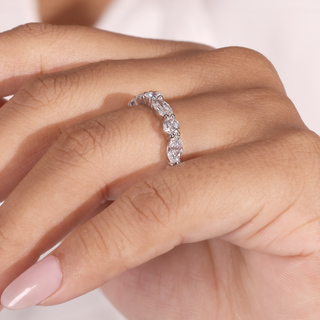White gold lab grown diamond anniversary band with alternating marquise and round diamonds in open prong settings.