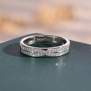 White gold lab grown diamond crossover wedding ring with two curved pavé rows meeting at the center.