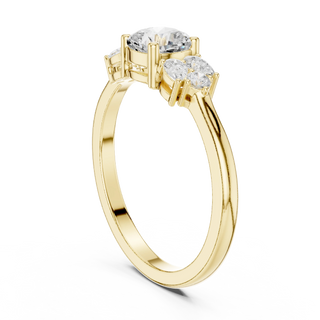 Cushion lab grown diamond three stone ring in yellow gold