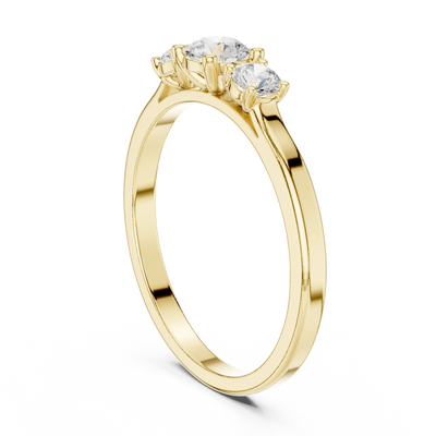 Round diamond three stone ring in yellow gold