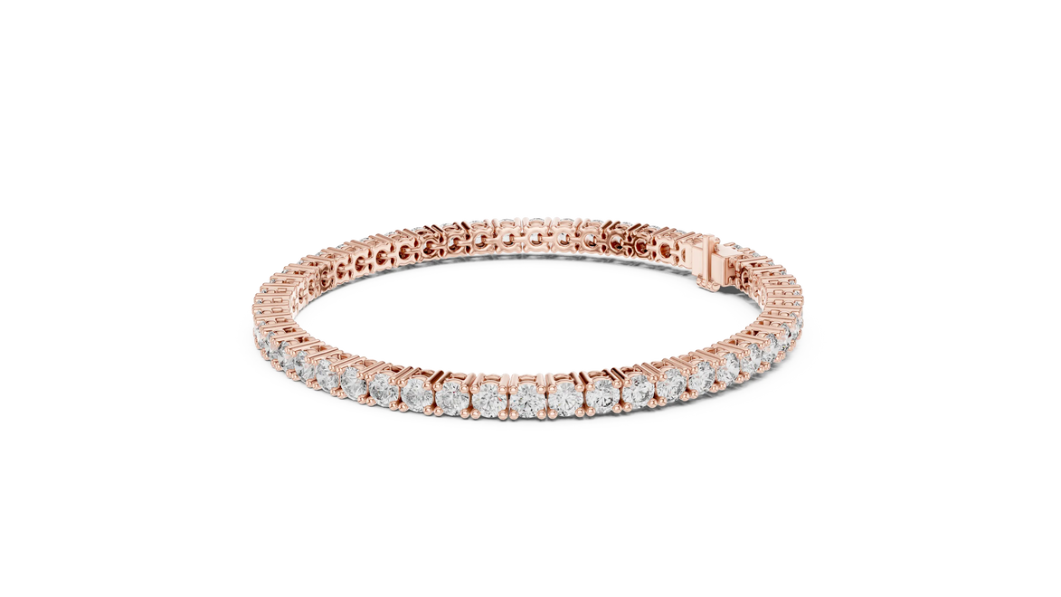 Classic round diamond tennis bracelet available in yellow gold white gold and rose gold with 49 brilliant diamonds in elegant collet setting design