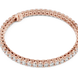 Rose gold bracelet with diamonds on a white background