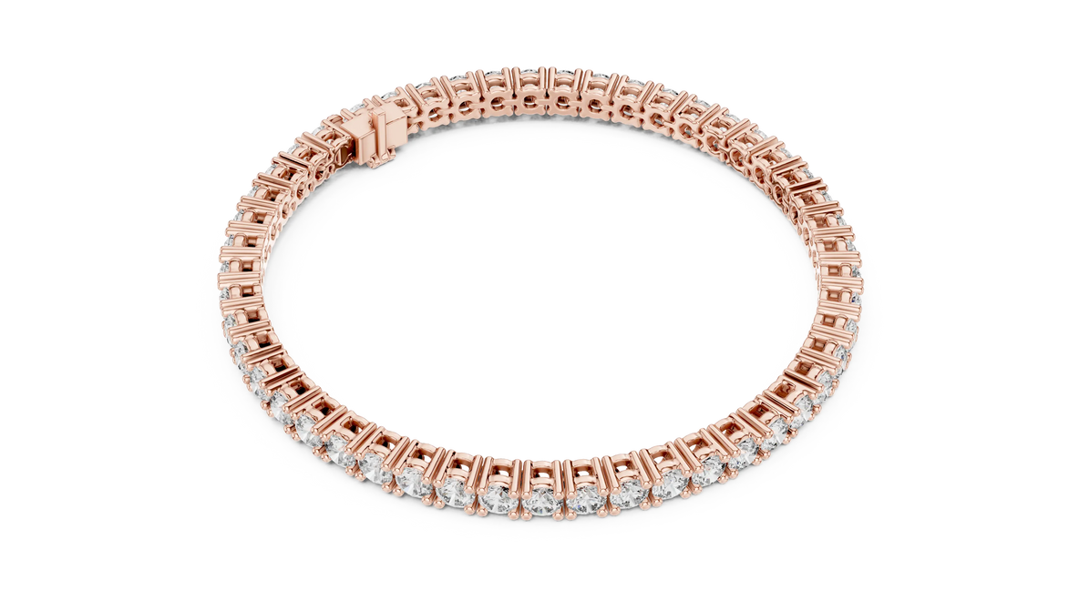 Classic round diamond tennis bracelet available in yellow gold white gold and rose gold with 49 brilliant diamonds in elegant collet setting design