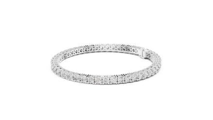 Classic round diamond tennis bracelet available in yellow gold white gold and rose gold with 49 brilliant diamonds in elegant collet setting design