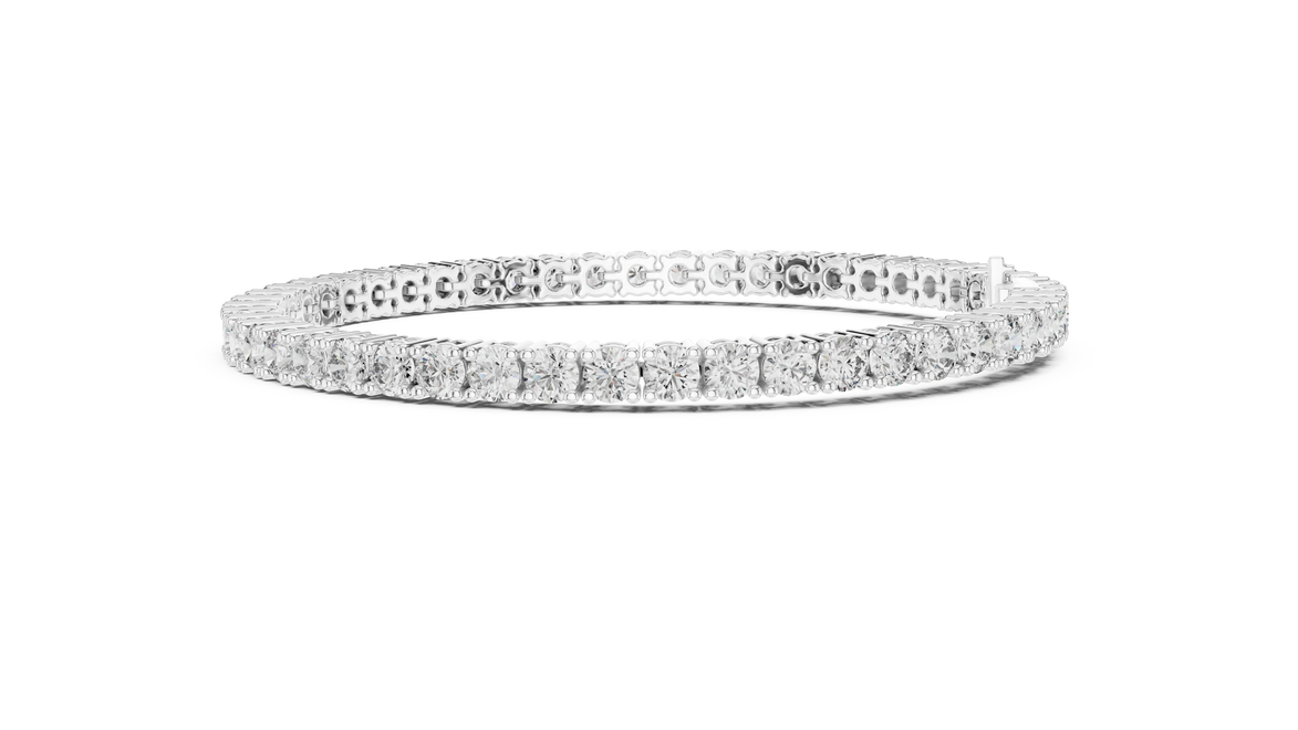 Classic round diamond tennis bracelet available in yellow gold white gold and rose gold with 49 brilliant diamonds in elegant collet setting design