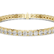 Gold bracelet with diamonds on a white background