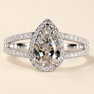 Pear Cut Lab Grown Diamond Halo Engagement Ring in white gold with split cathedral micro pavé shank