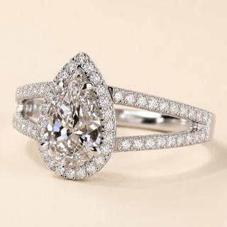 Pear Cut Lab Grown Diamond Halo Engagement Ring in white gold with split cathedral micro pavé shank