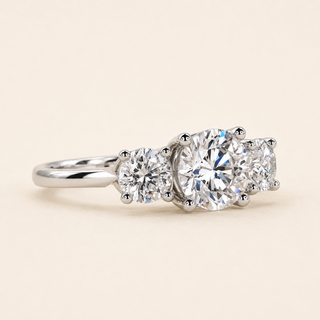 Round Lab Grown Diamond Three-Stone Engagement Ring with Trellis Basket Setting in White Gold