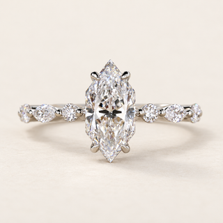 Marquise cut lab grown diamond engagement ring in white gold with elongated Dutch marquise center and alternating marquise and round diamond shoulders.
