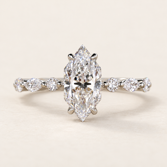 Marquise cut lab grown diamond engagement ring in white gold with elongated Dutch marquise center and alternating marquise and round diamond shoulders.