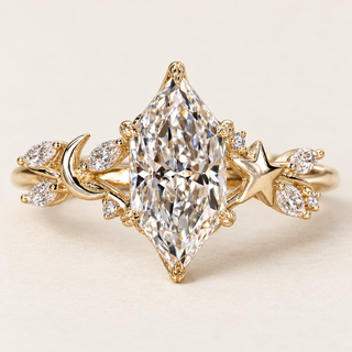 Dutch marquise cut lab grown diamond engagement ring with 2 ct center, leaf-shaped protective prongs, crescent moon, star and marquise diamond accents in yellow gold.