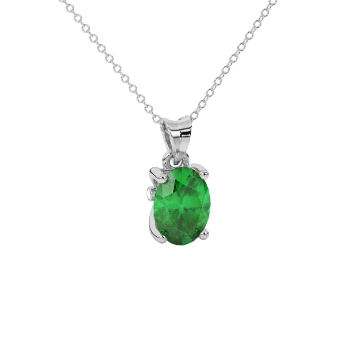 Close-up emerald green gemstone pendant, white gold surprise diamond setting.