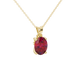 Close-up, oval cut raspberry red gemstone, yellow gold surprise diamond pendant.