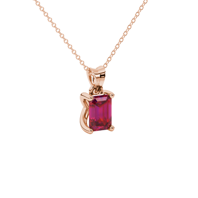Emerald cut red gemstone solitaire pendant in white gold four prong setting