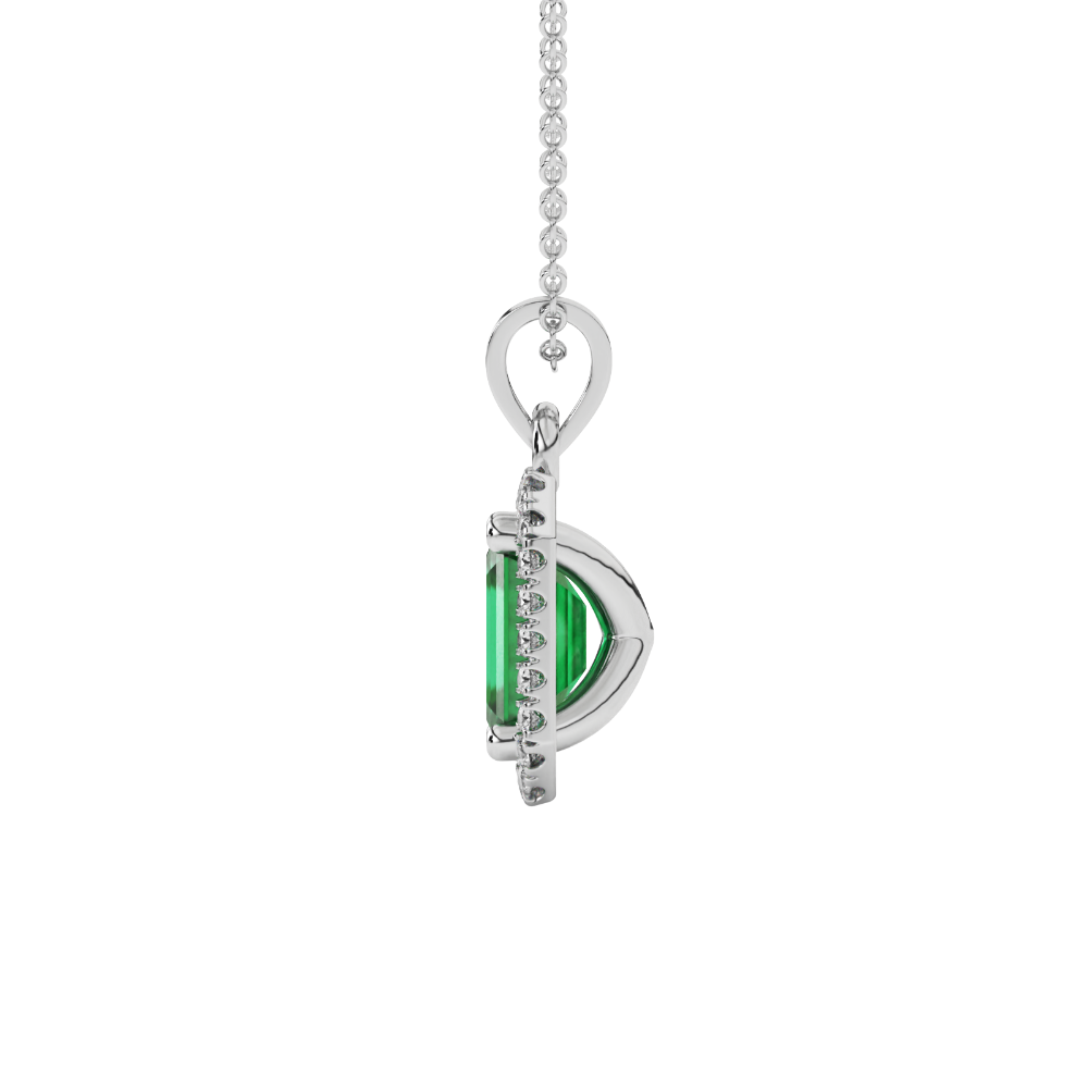Emerald cut green gemstone halo pendant with round diamond accents