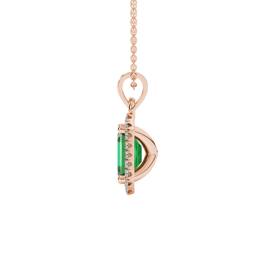 Emerald cut green gemstone halo pendant with round diamond accents