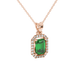 Emerald cut green gemstone halo pendant with round diamond accents