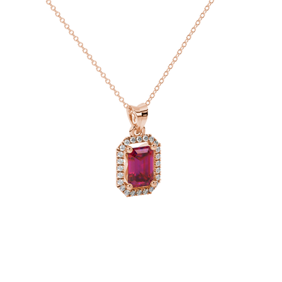 Emerald cut red gemstone halo pendant with round diamond accents