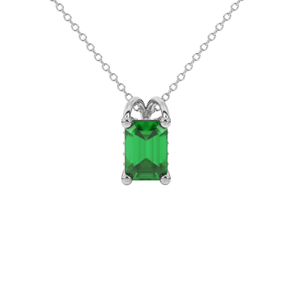 Emerald cut green gemstone solitaire pendant in yellow gold four prong setting