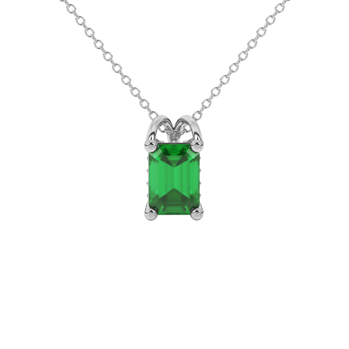 Emerald cut green gemstone solitaire pendant in yellow gold four prong setting