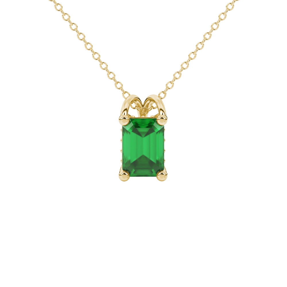 Emerald cut green gemstone solitaire pendant in yellow gold four prong setting