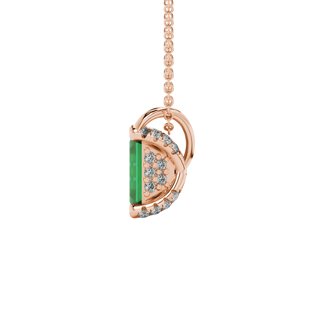 Emerald cut green gemstone solitaire pendant in yellow gold four prong setting