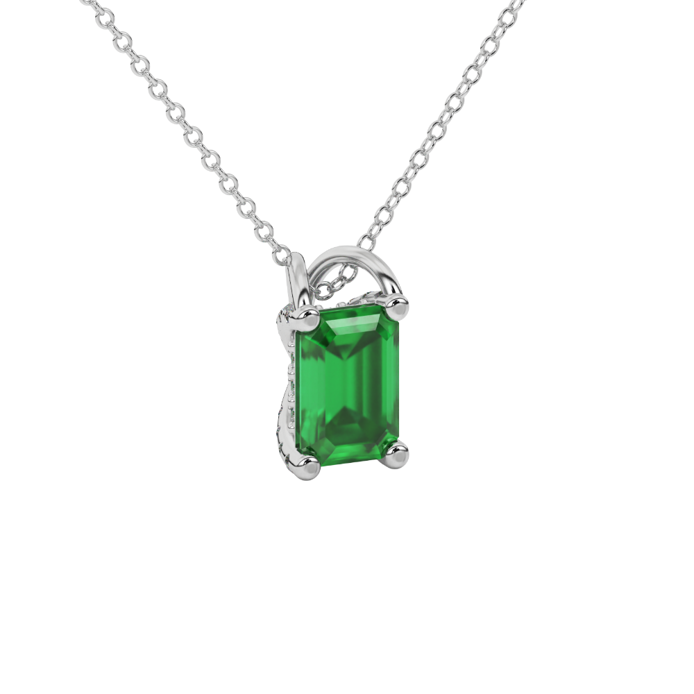 Emerald cut green gemstone solitaire pendant in yellow gold four prong setting