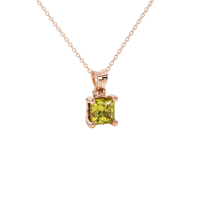 Close-up, princess canary yellow gemstone pendant, rose gold lotus setting.