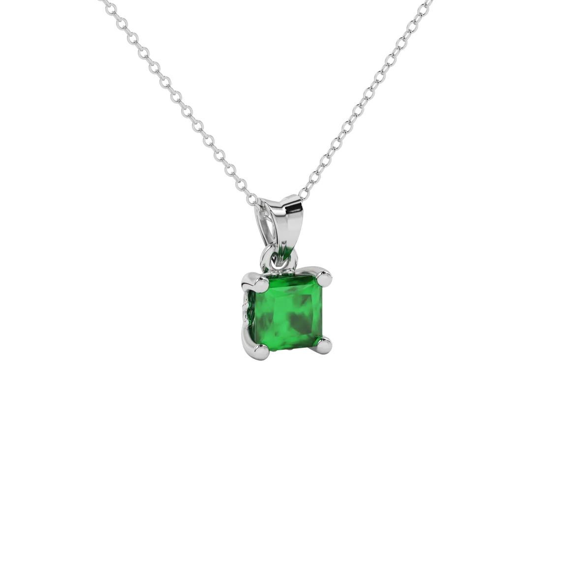 Close-up emerald green gemstone, white gold lotus setting.