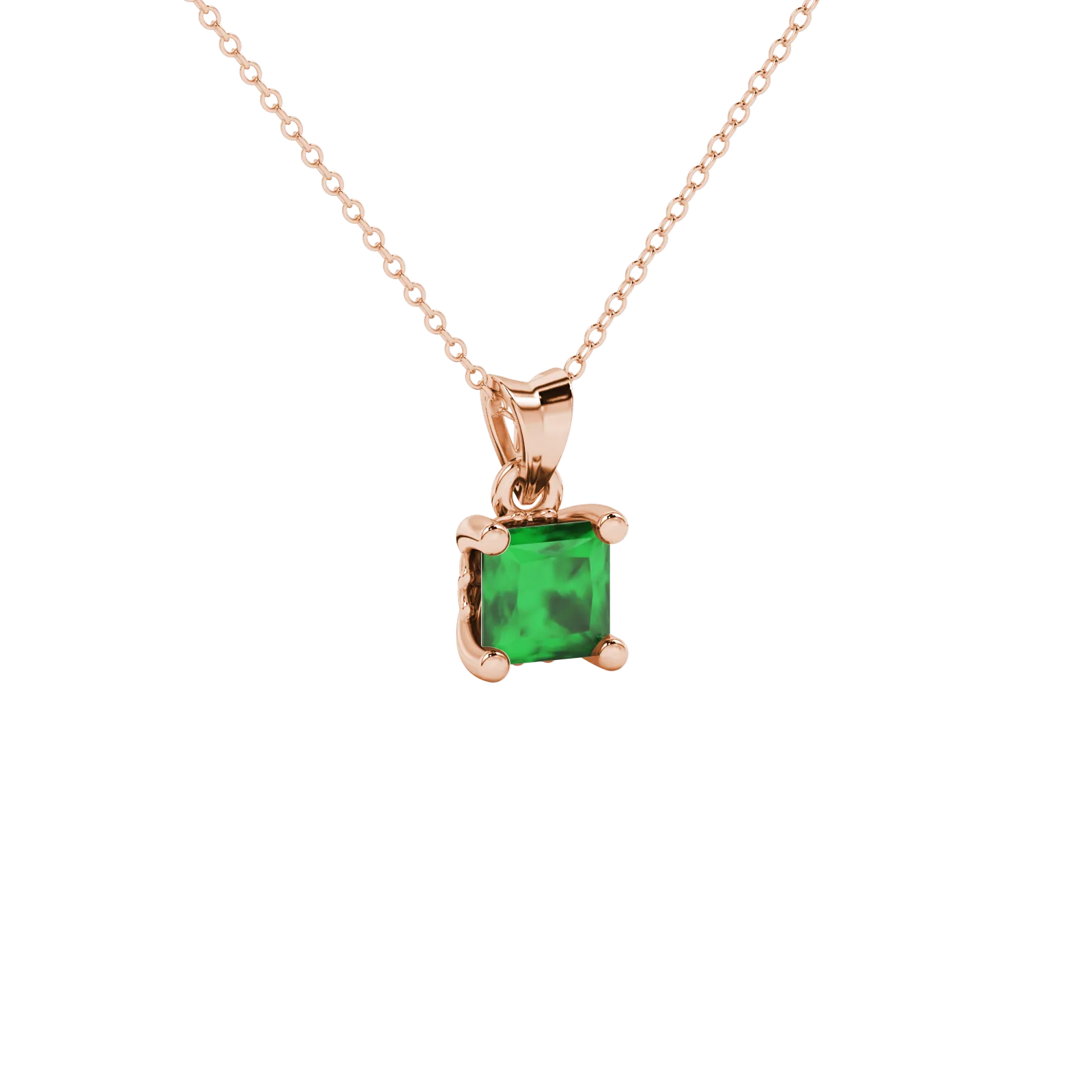 Close-up, princess emerald green gemstone pendant, rose gold lotus setting.