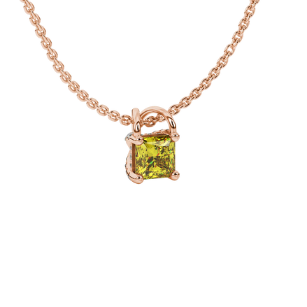 Close-up, princess canary yellow gemstone pendant, rose gold basket setting.