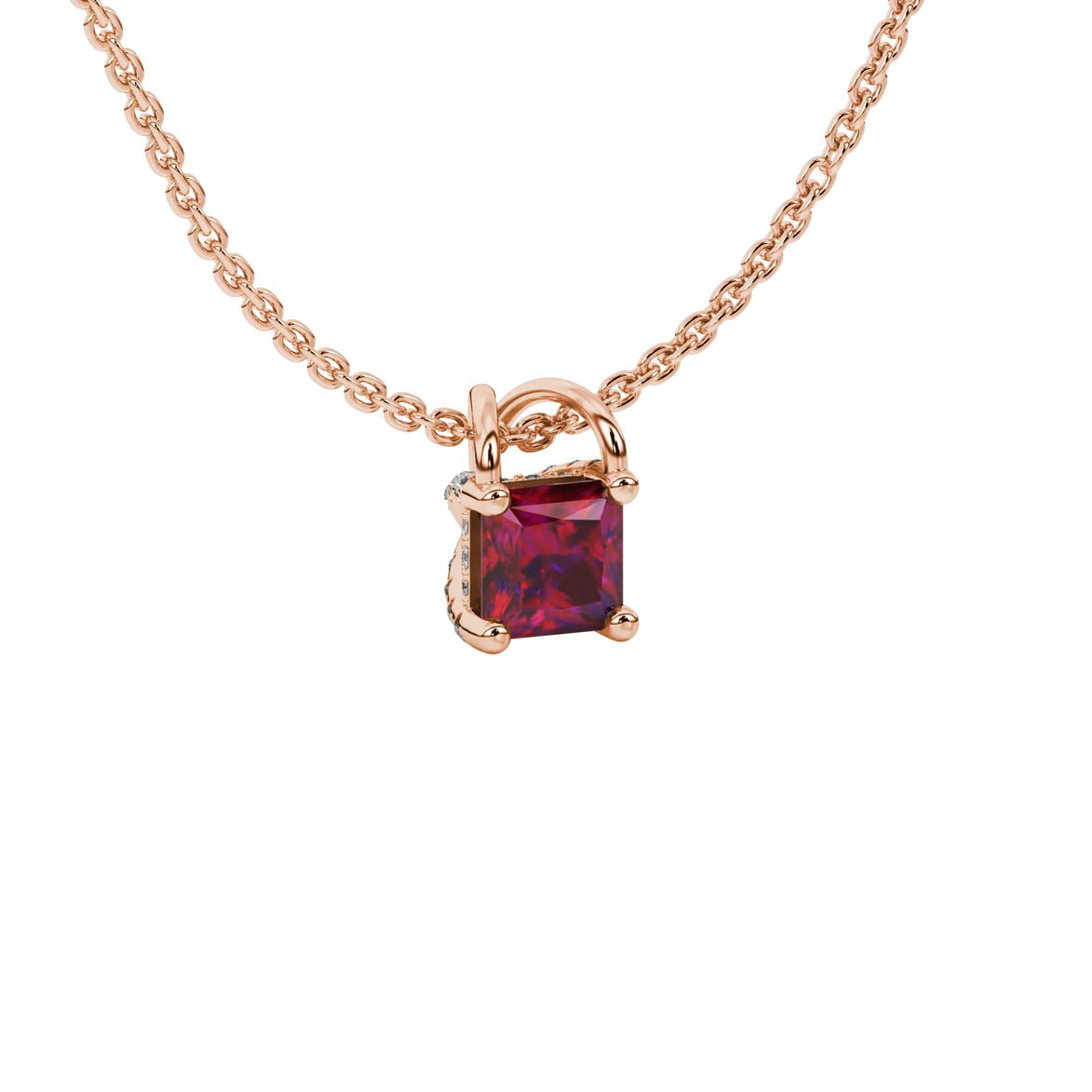 Close-up, princess raspberry red gemstone pendant, rose gold basket setting.