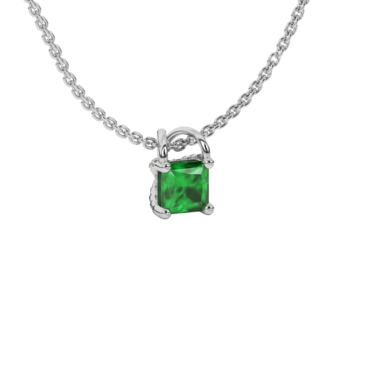 Close-up emerald green gemstone, white gold basket setting.