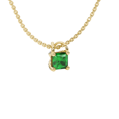 Close-up, princess emerald green gemstone, yellow gold basket pendant.