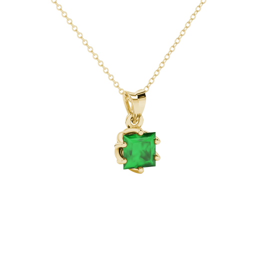 Close-up, princess emerald green gemstone, yellow gold scalloped pendant.