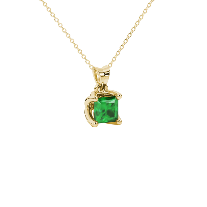 Close-up, princess emerald green gemstone, yellow gold tulip pendant.