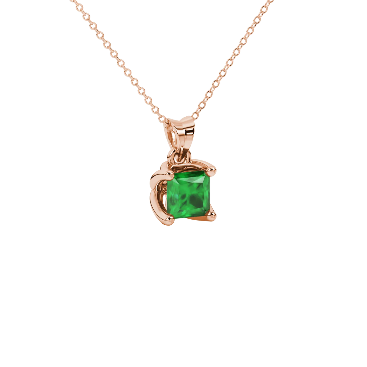 Close-up, princess emerald green gemstone pendant, rose gold tulip setting.