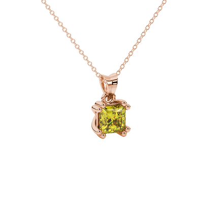 Close-up, princess canary yellow gemstone pendant, rose gold vintage setting.