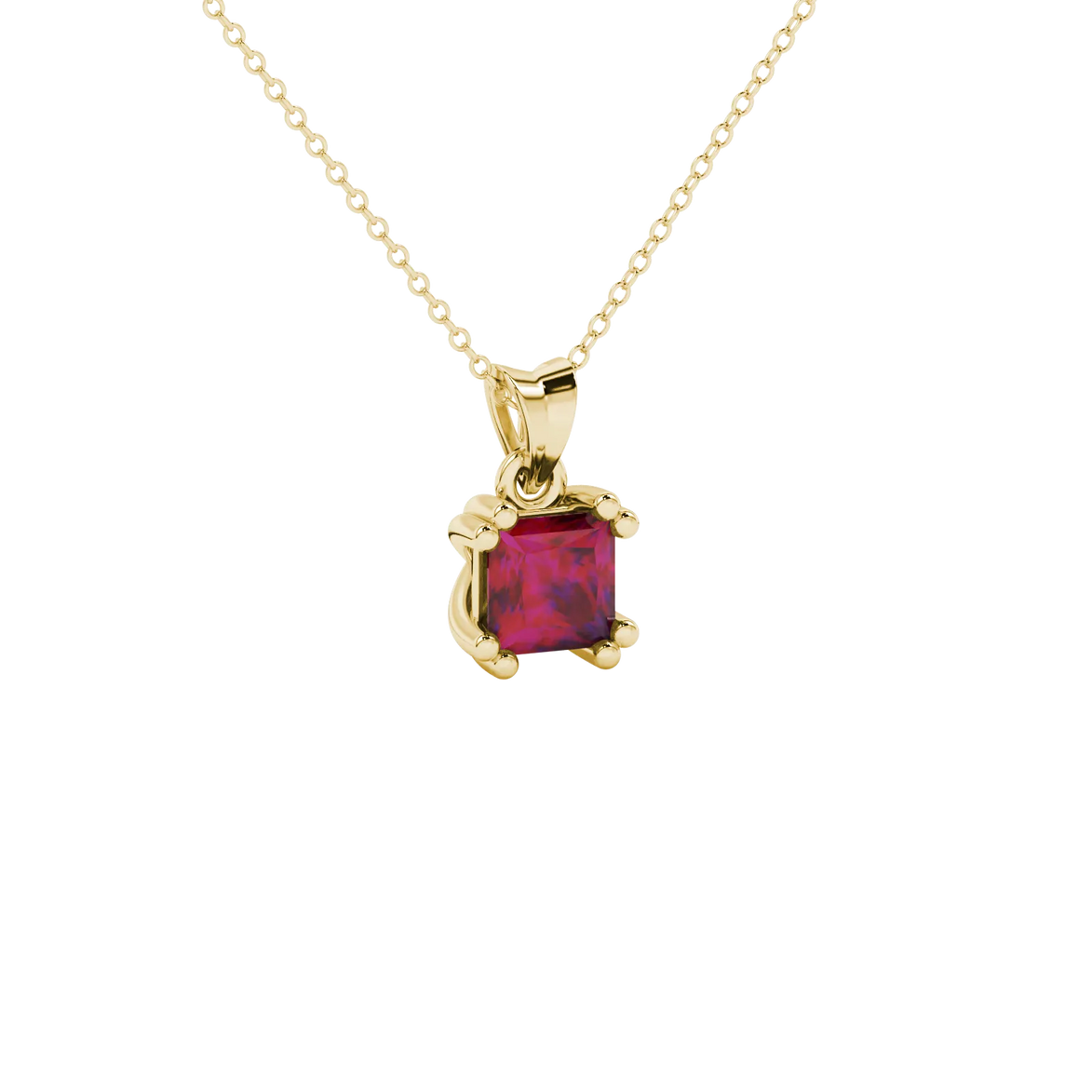 Close-up, princess raspberry red gemstone, yellow gold vintage pendant.