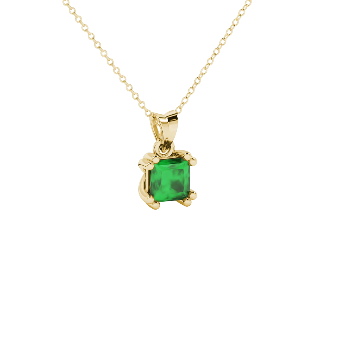 Close-up, princess emerald green gemstone, yellow gold vintage pendant.