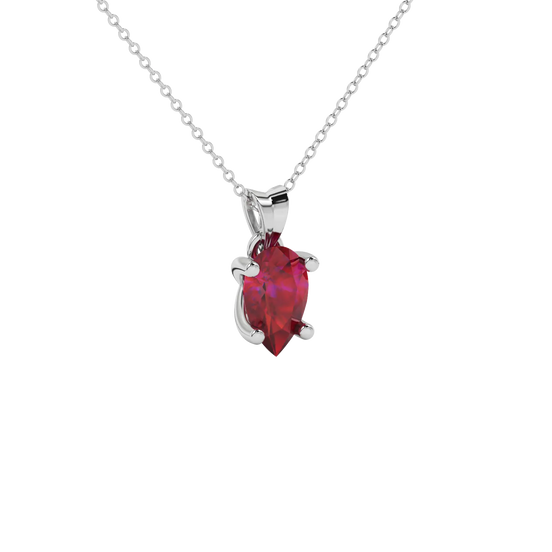 Close-up raspberry red gemstone, white gold four-prong setting.