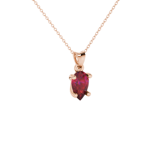 Close-up, pear shape raspberry red gemstone pendant, rose gold classic basket.